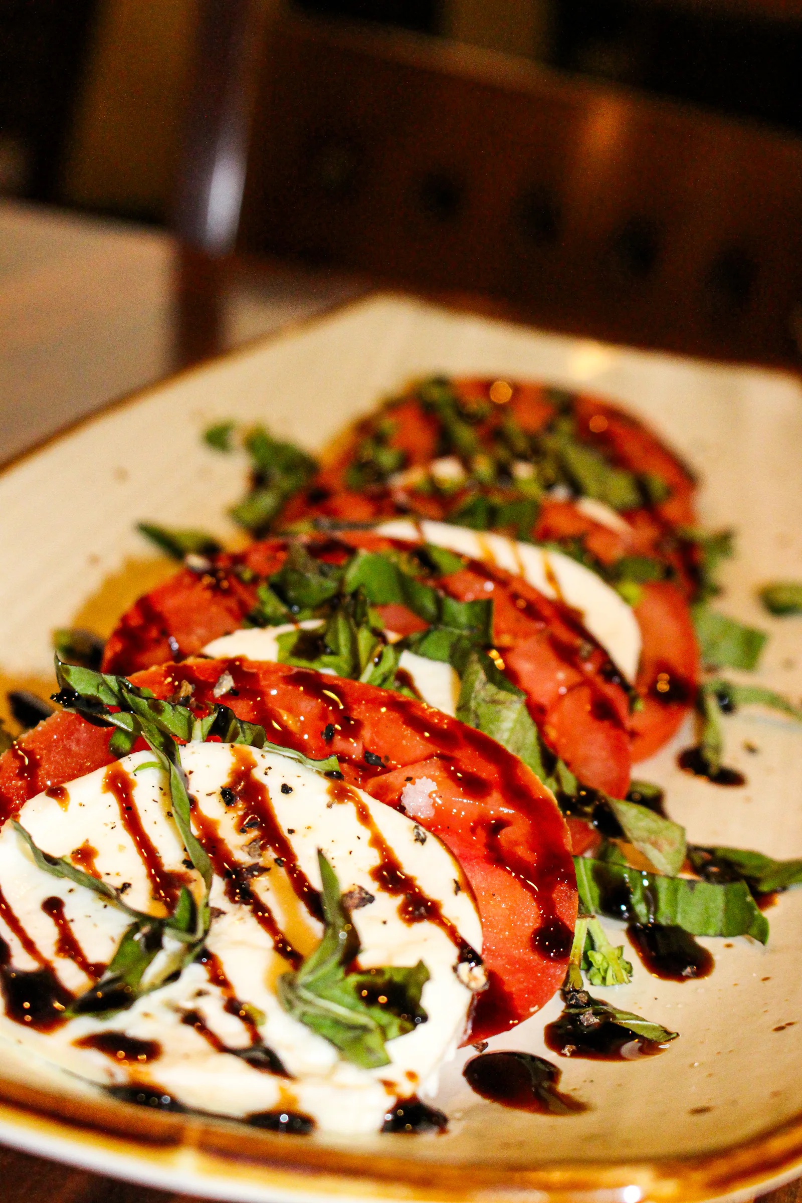 Caprese salad with mozzarella, tomatoes and basil