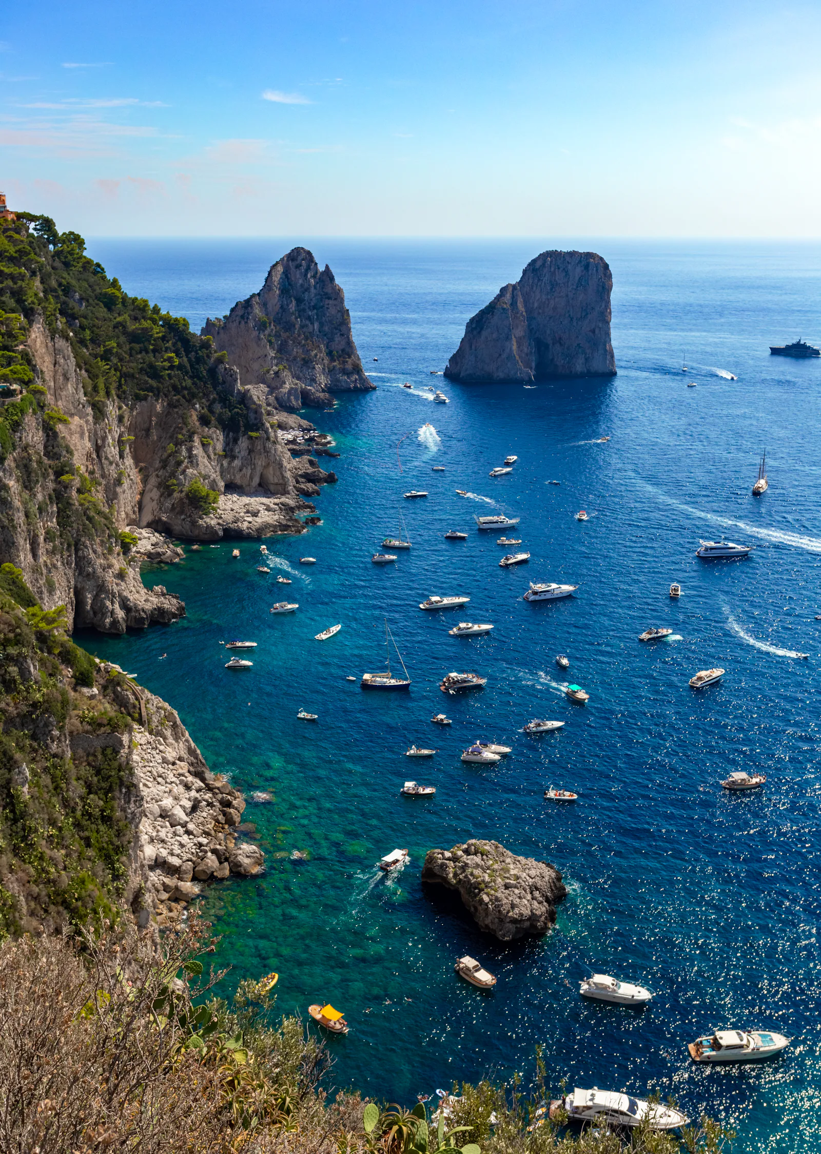 Yachts at anchor beneath the cliffs of Capri