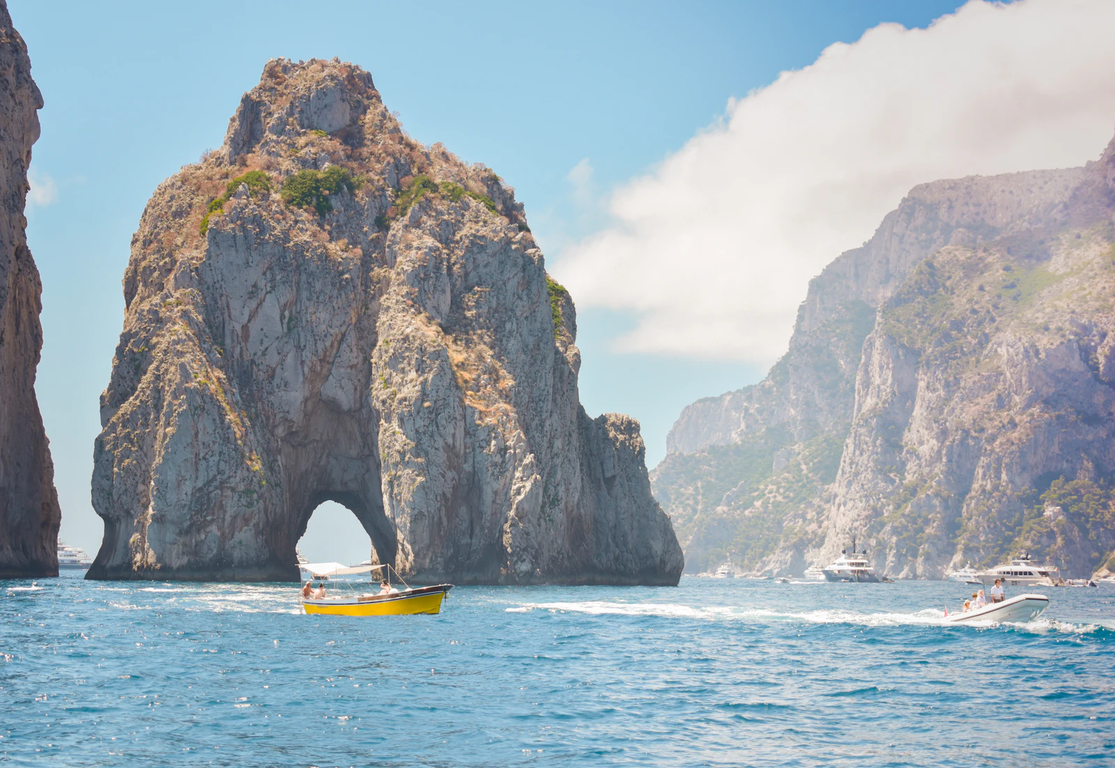 The Faraglioni rocks of Capri rising from the sea